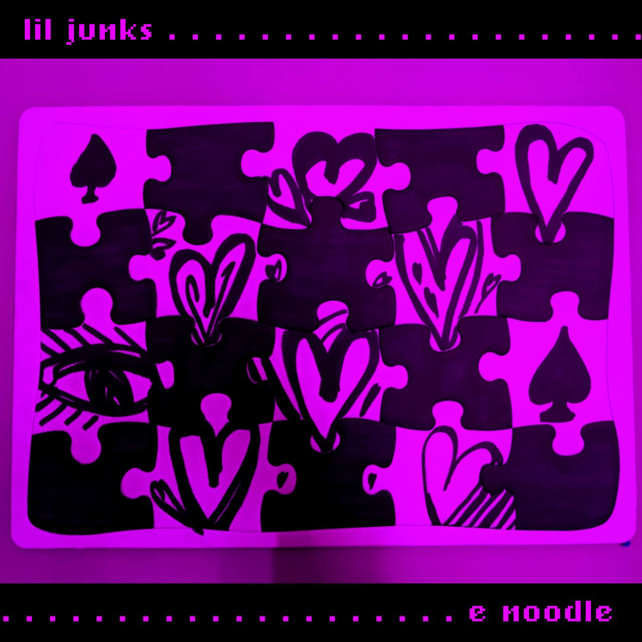 lil junks release cover. oversized puzzle with hearts, aces, and eye.