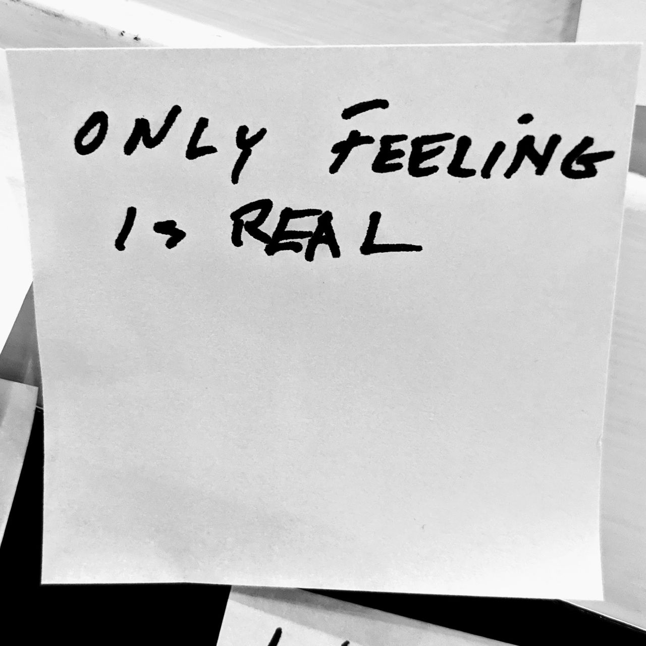 spring a ep release cover. sticky note marked 'only feeling is real'.